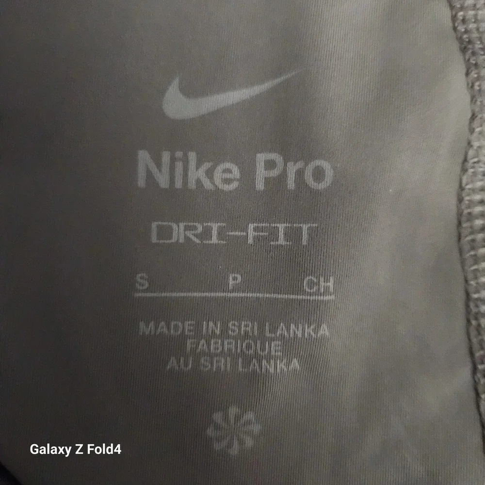 Nike Pro‎ Womens Dri-FIT High-Rise 7/8 Graphic Leggings Moon Fossil Brown Small